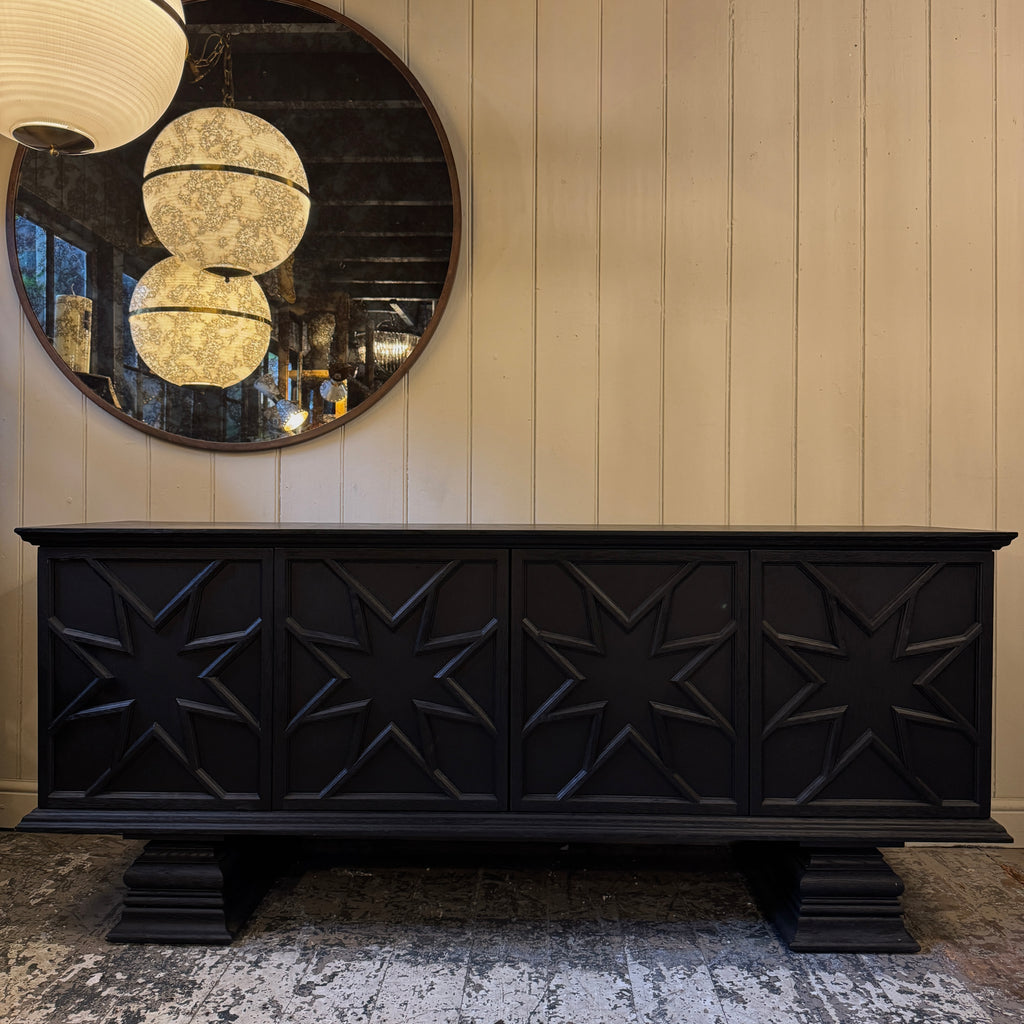 Black decorative cabinet with star patterns, ebonised oak, star motif