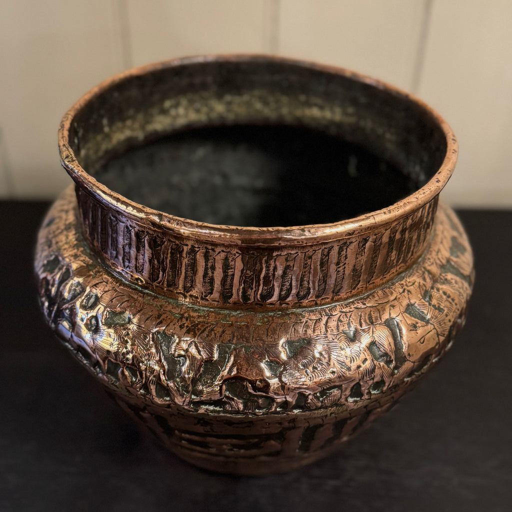Decorative bronze vase with intricate patterns, persian planter
