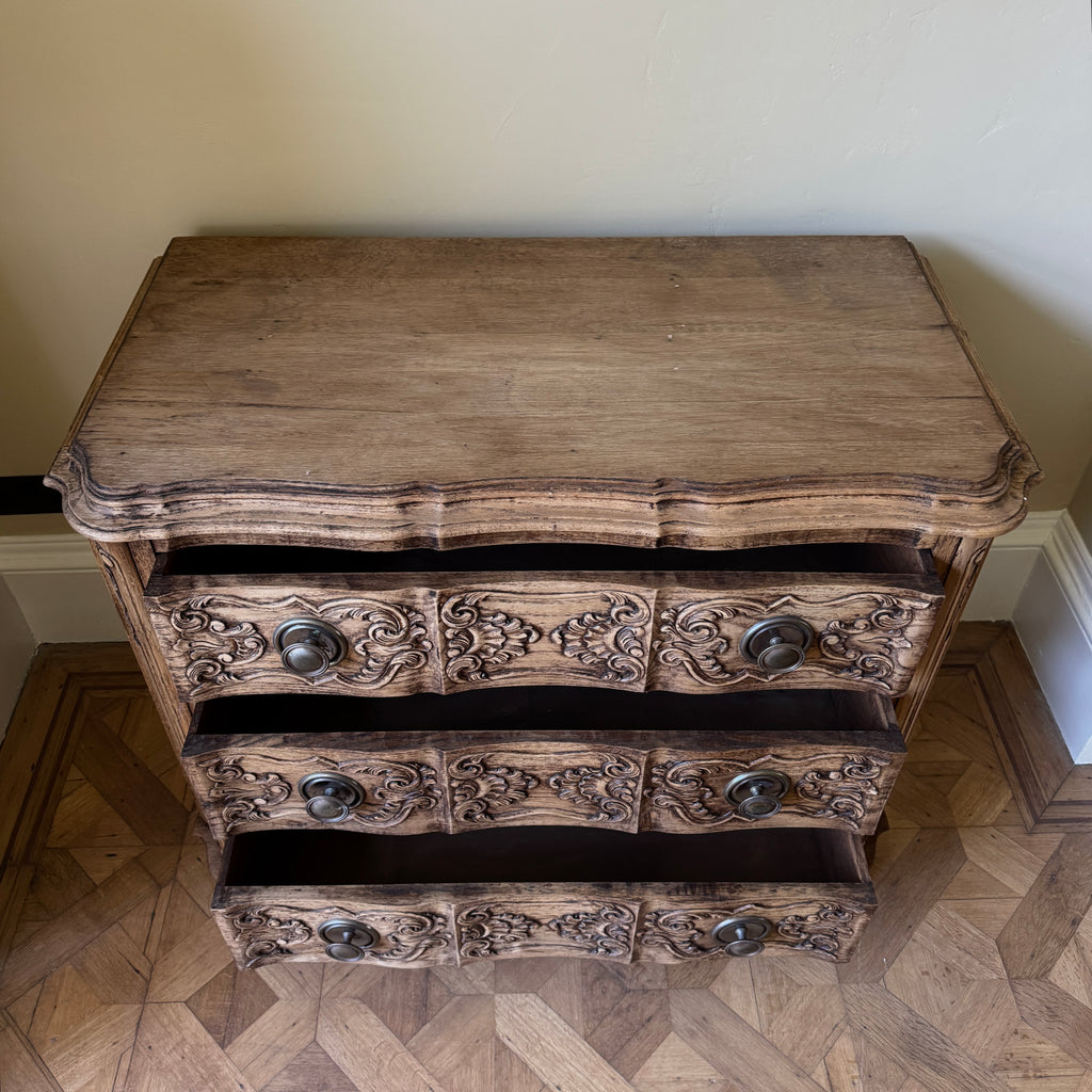 Wooden dresser with intricate carvings 