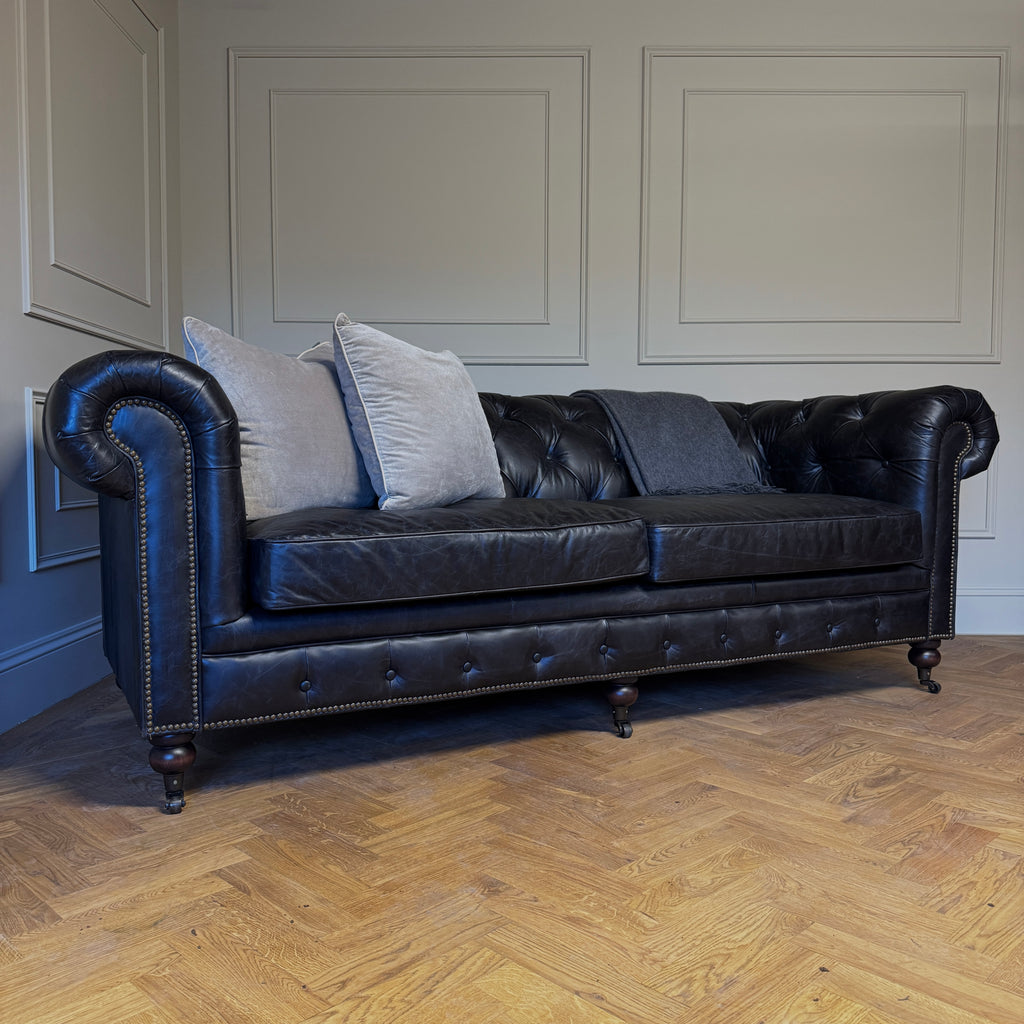 black chesterfield sofa, black leather sofa, Argentinian leather, Argentinian black leather Chesterfield sofa, deep buttoned leather sofa, classic Chesterfield sofa, dorking interiors, Surrey interiors, Sandrock house, furniture shop, furniture shop Surrey, dorking furniture shop