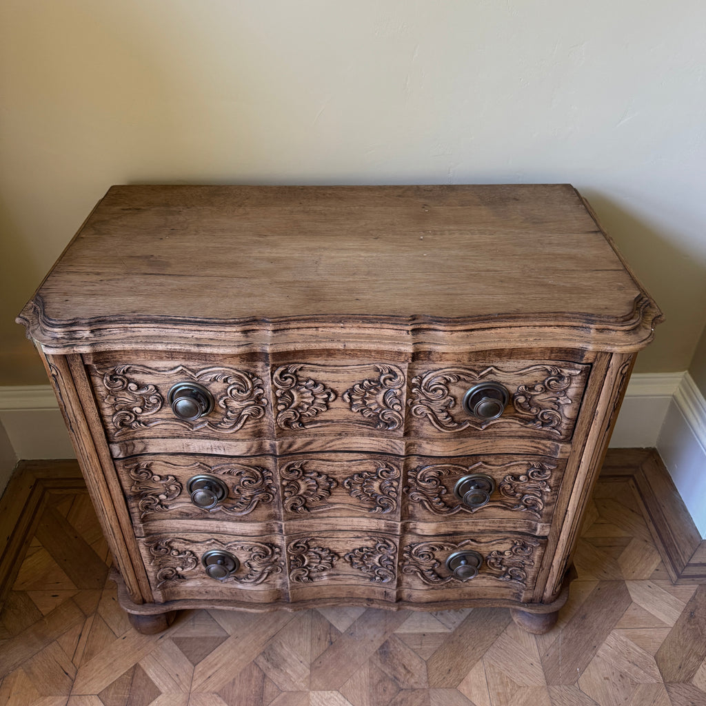Wooden dresser with intricate carvings