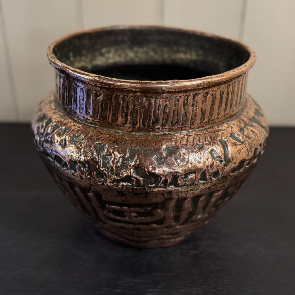 Decorative bronze vase with intricate patterns, persian planter