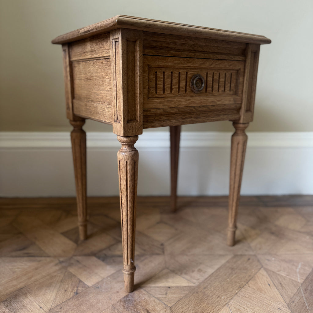 Two wooden side tables with a drawer each, ring pull handles, tapered legs