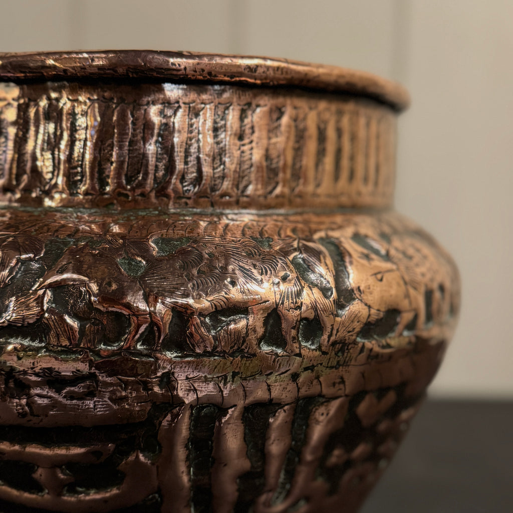 Decorative bronze vase with intricate patterns, persian planter