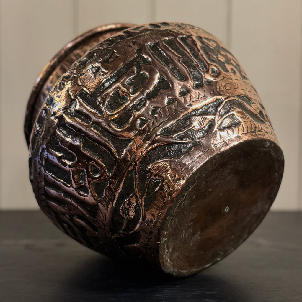 Decorative bronze vase with intricate patterns, persian planter