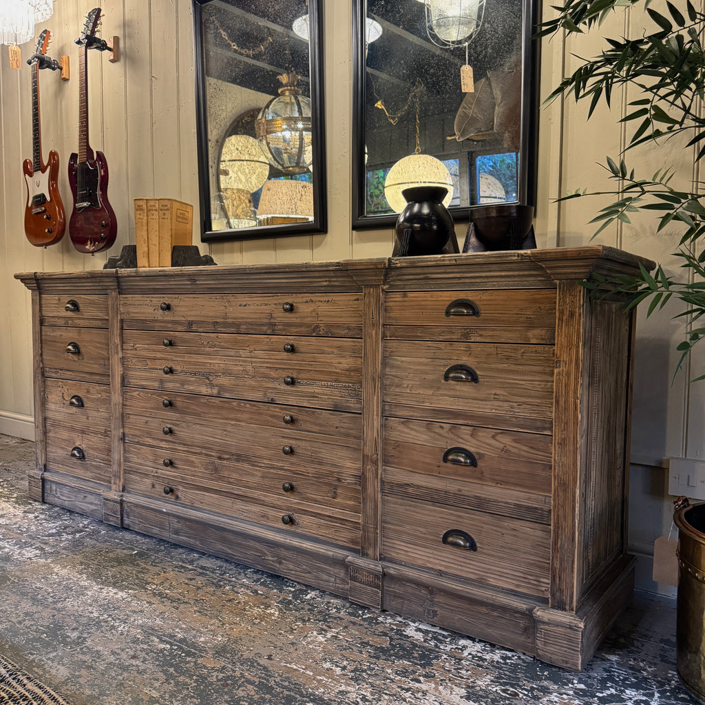Wooden dresser with multiple drawers 