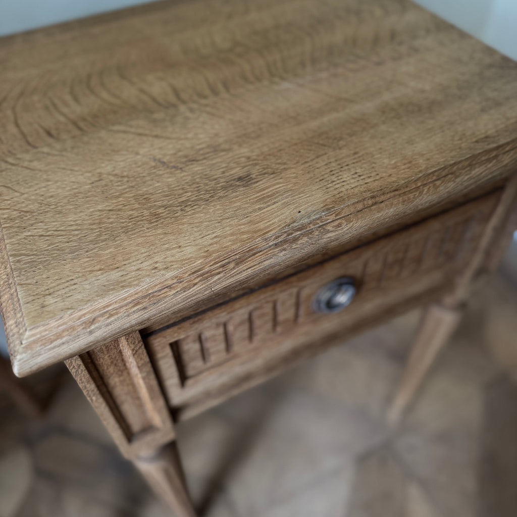 Two wooden side tables with a drawer each, ring pull handles, tapered legs